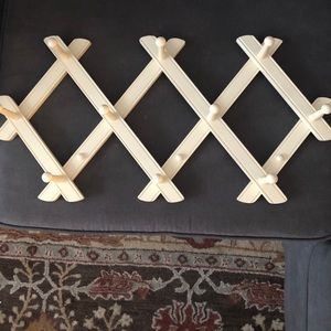 The Land of Knob antique white accordion peg rack